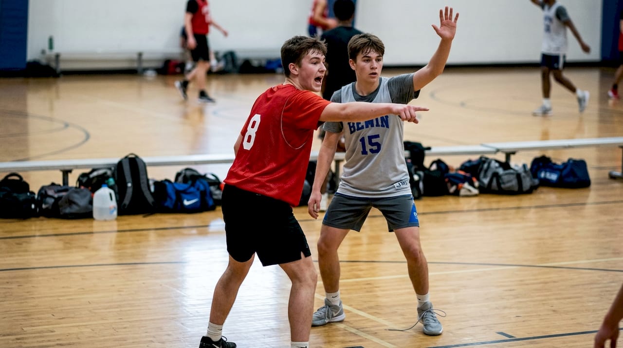 Players use hand signals during scrimmage