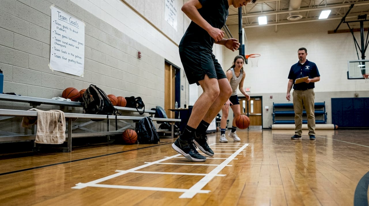 Players doing basketball agility warm-up