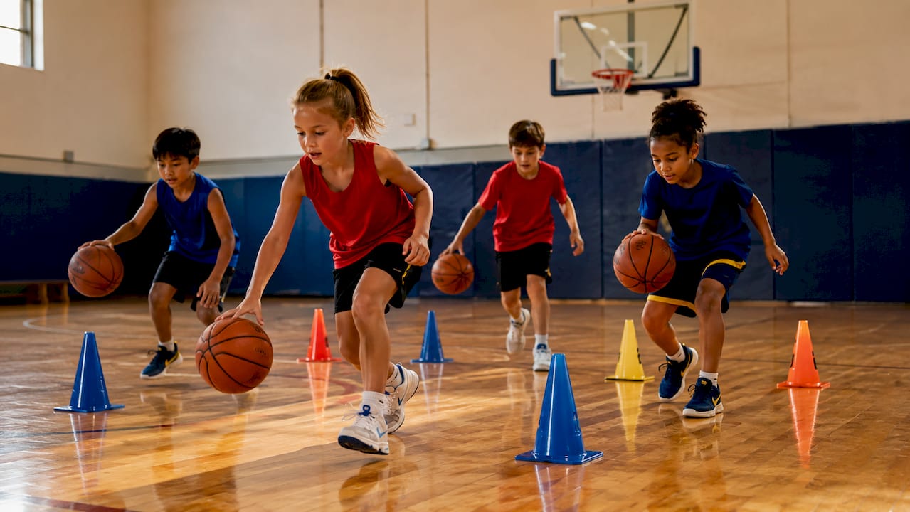 Children playing youth basketball mini-games