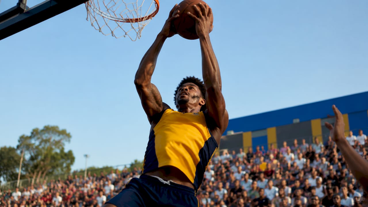 Player securing rebound during offensive play