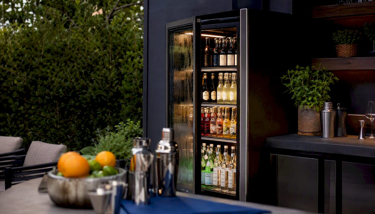 Opened glass door back-bar beverage cooler