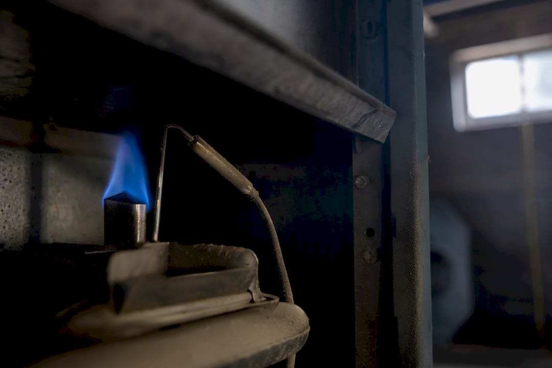 Close-up of furnace thermocouple near pilot flame