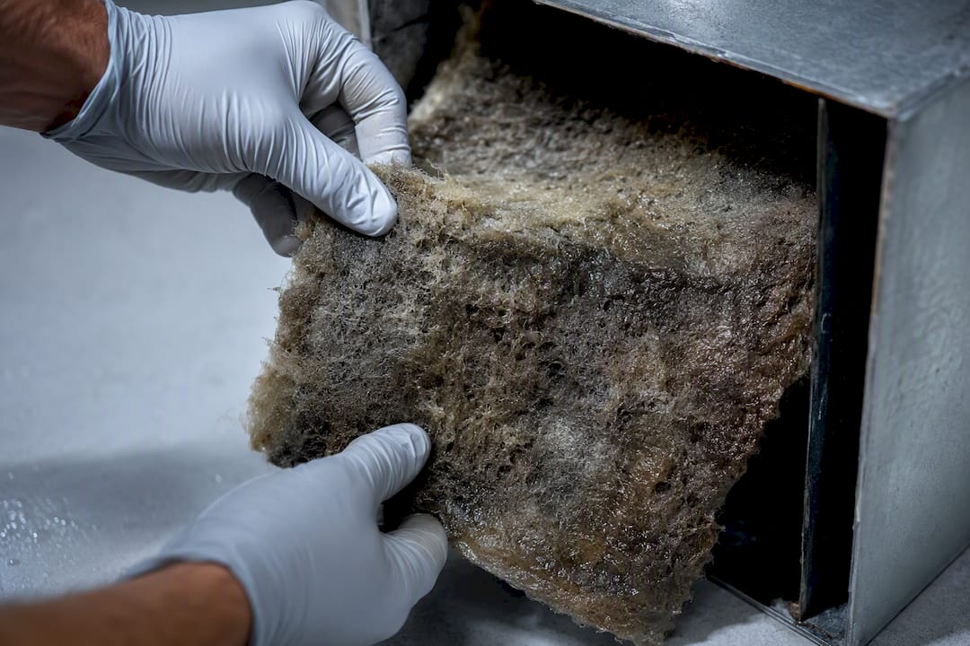 Water damaged fiberglass duct liner