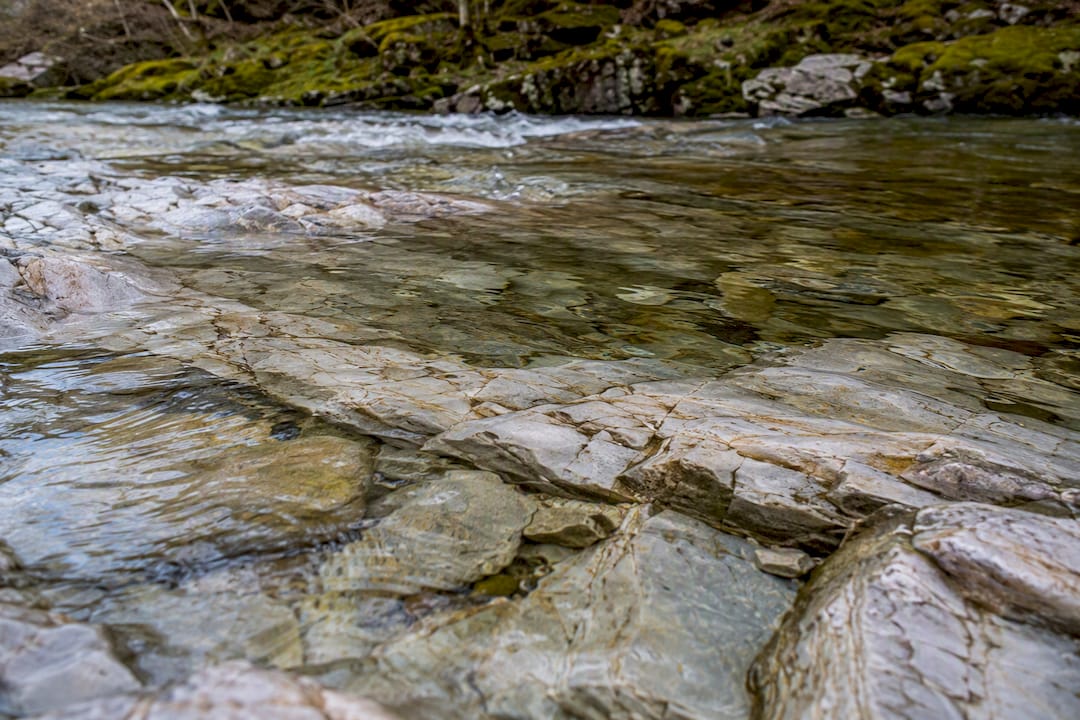 Clear Speyside stream flowing over quartzite