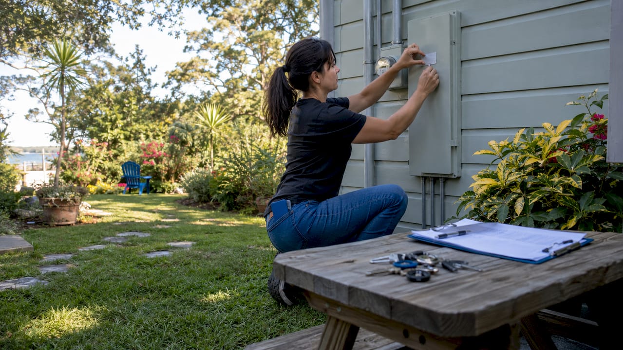 Seller preparing home inspection access indoors