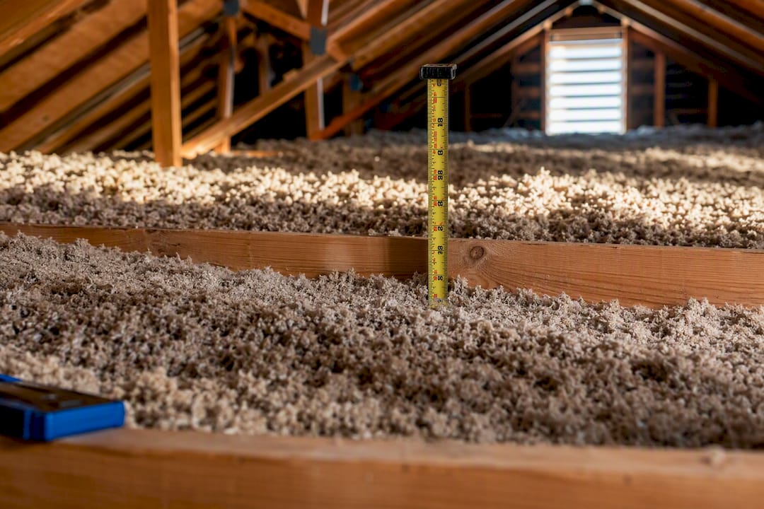 Measuring loose-fill insulation depth in attic