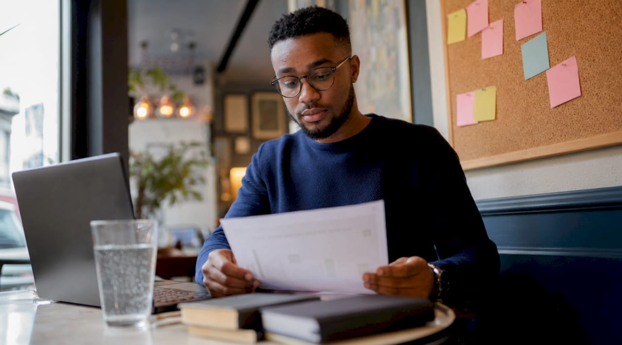 Website consultant reviewing project checklist