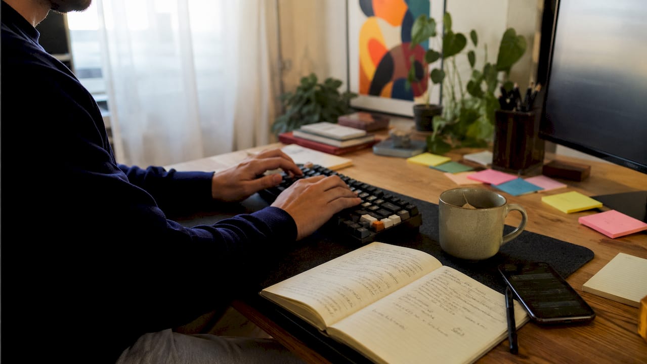 Hands typing code optimizing website speed