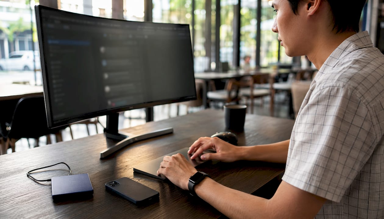 Side view of hands using WordPress admin tools
