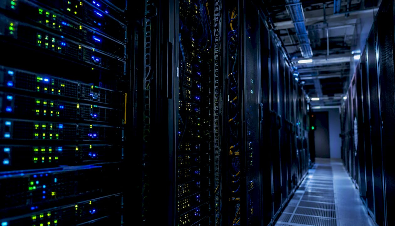 Server racks with blinking lights in room