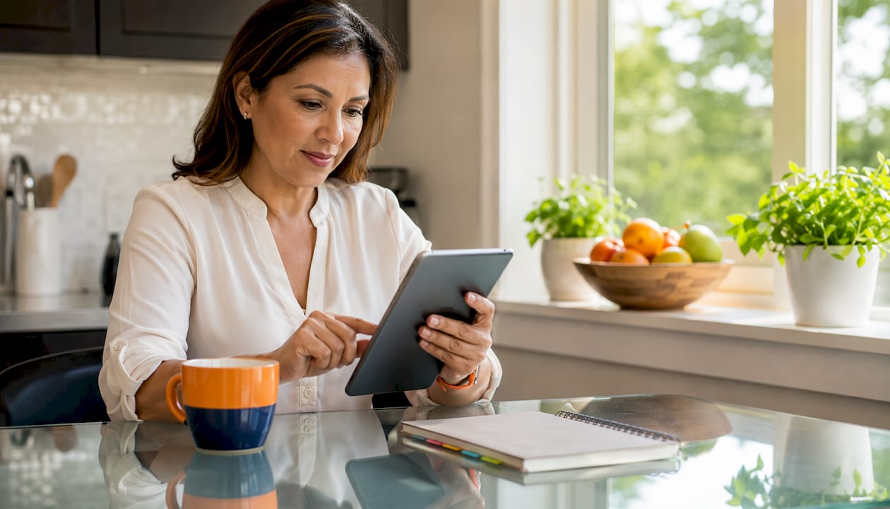 Benefits of Single Sign-On for IT and Business Teams 2 User engaging with productivity portal via tablet