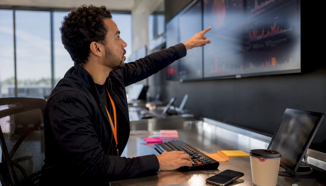 Security analyst monitoring authentication alerts