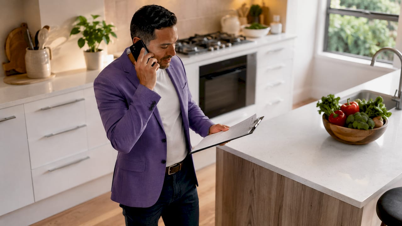 Agent inspecting home before listing