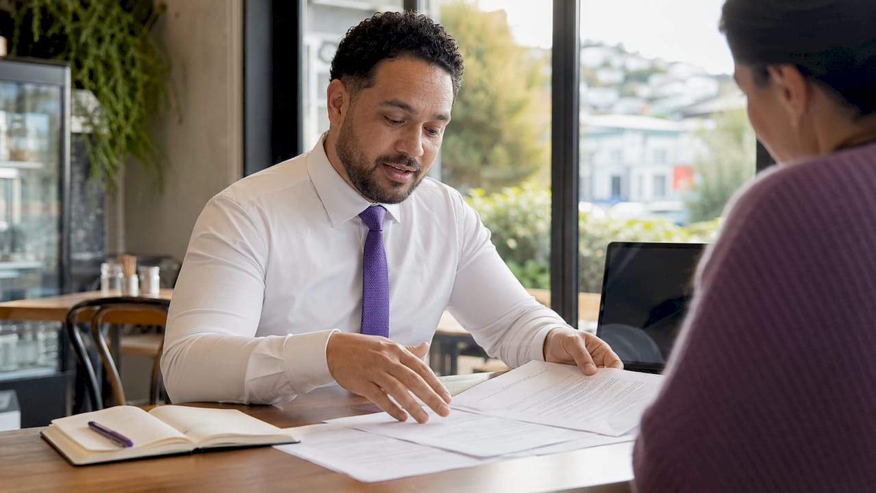 Legal professional reviewing mortgage documents