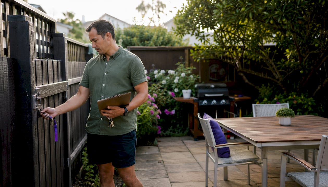 Man locking door before property viewing