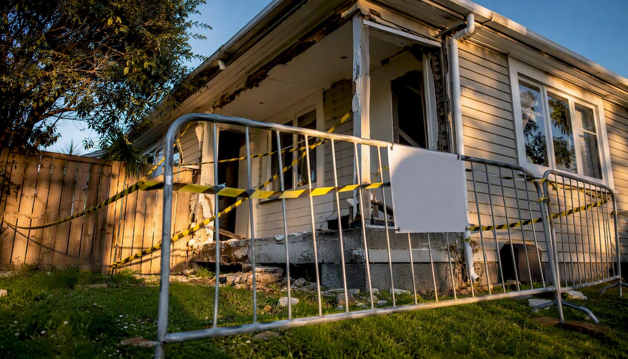 Safety barriers around damaged NZ house
