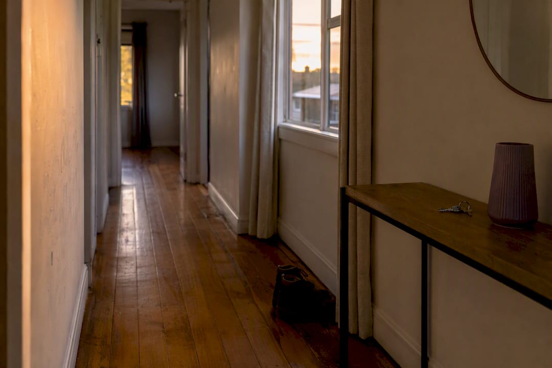 Empty NZ home hallway with keys