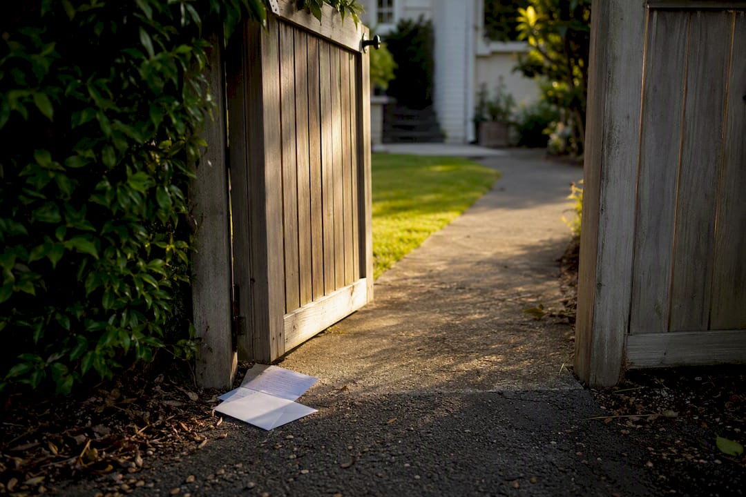NZ mailbox with bank statement envelope nearby