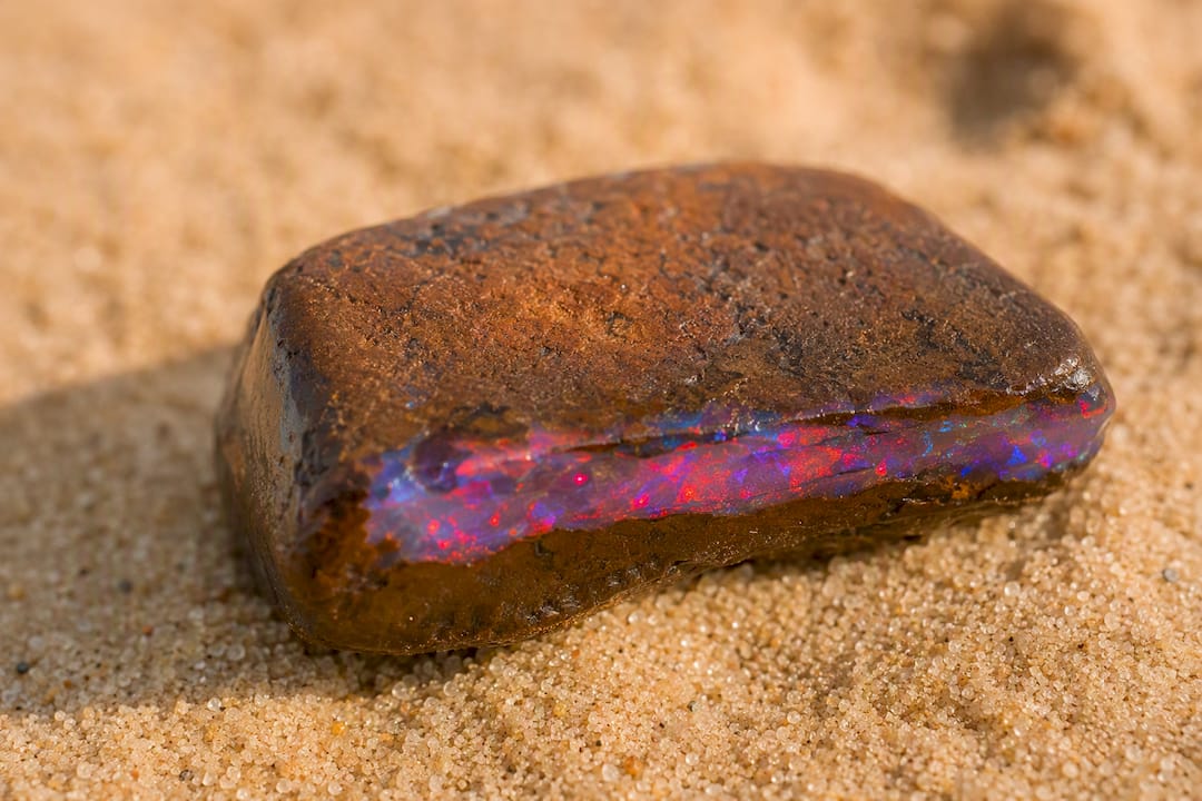 Close-up of boulder opal ironstone matrix and opal seam