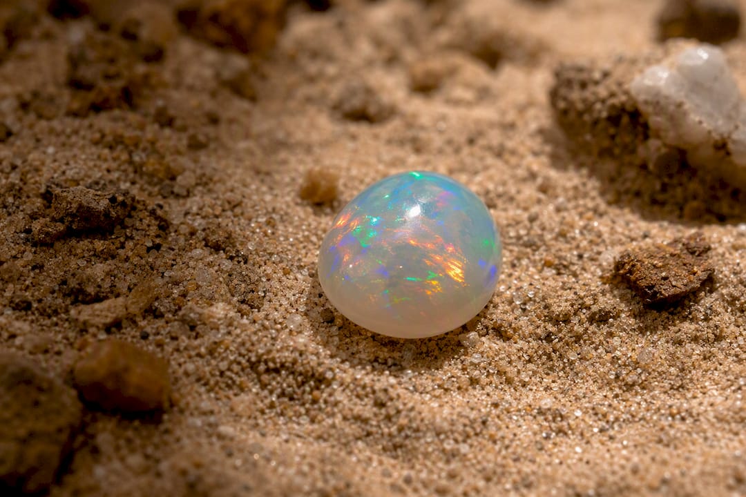 Close-up of crystal opal with internal color flashes