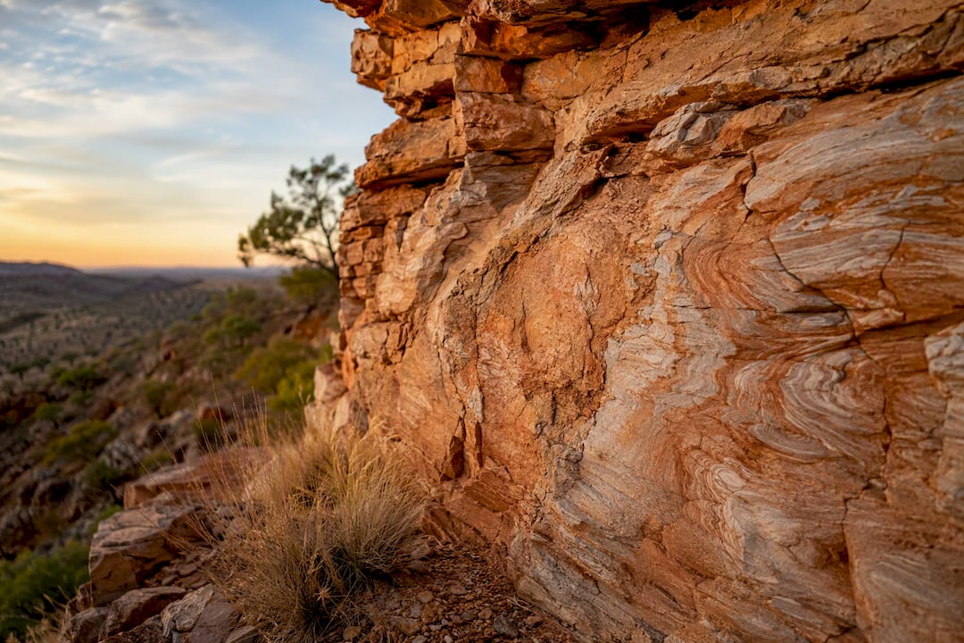 Sandstone rock surface with tiny cracks and sediment layers