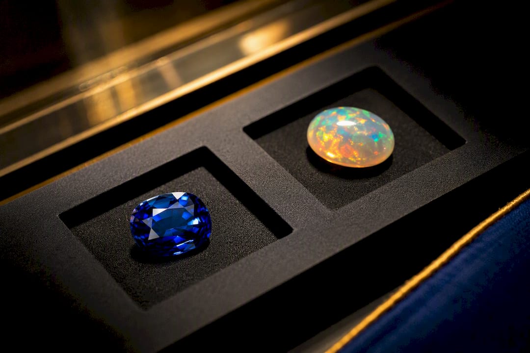 Sapphire and opal showing contrasting optical effects