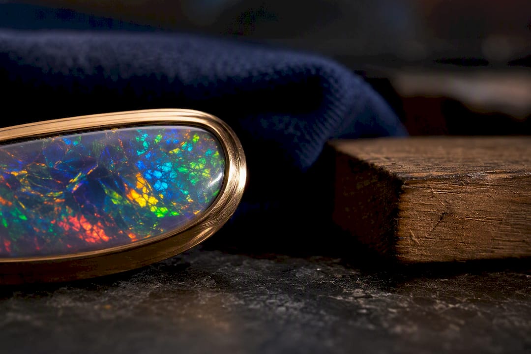 Partial opal bezel edge in jeweler workshop
