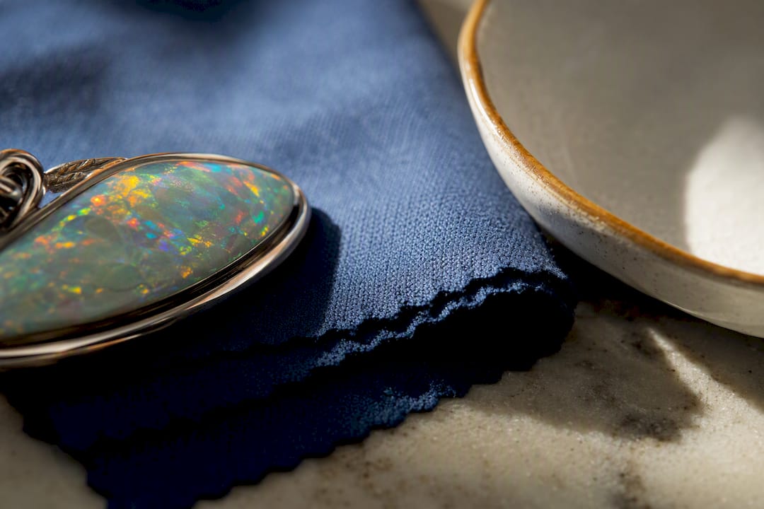 Cropped opal setting beside protective cloth