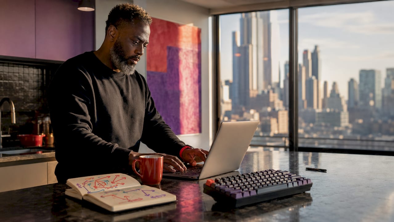 Man coding technical SEO in office