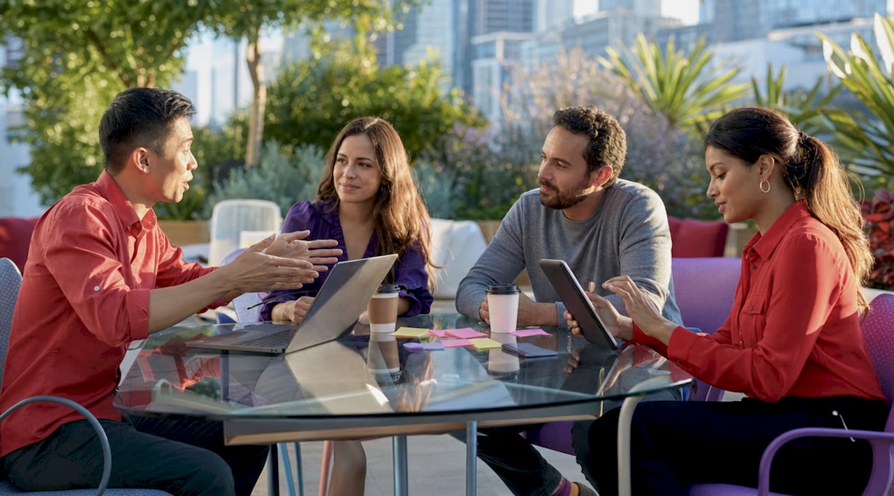 Team discussing digital ecosystem integration