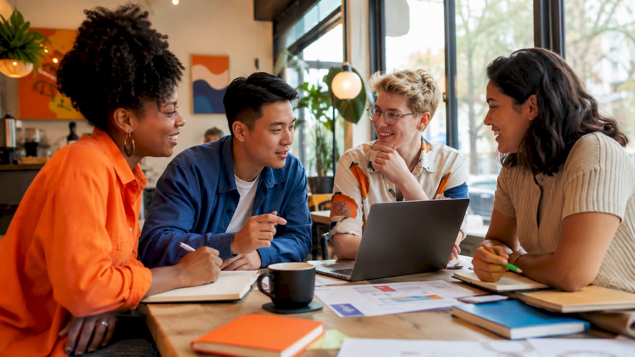 Diverse group collaborating in a meeting room