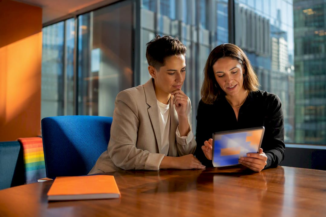 Candidate and recruiter reviewing finance job listing