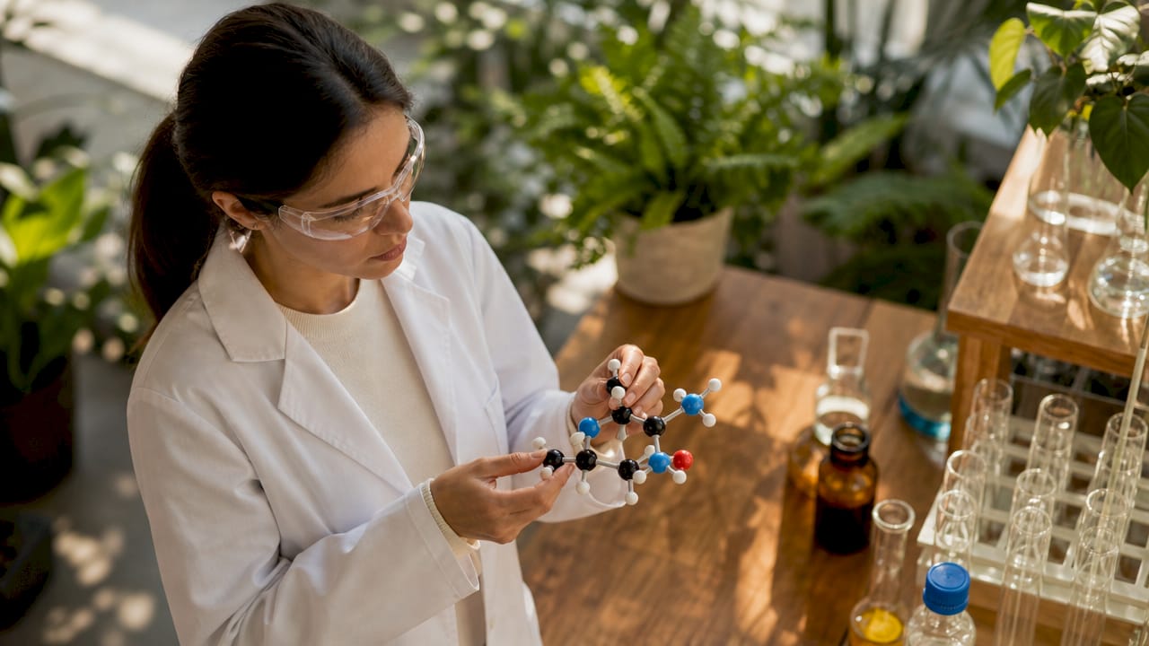 Scientist studying nitric oxide synthesis process