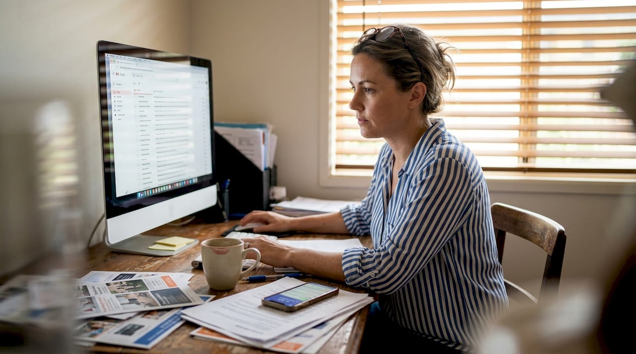 Business owner reviewing digital advertising leads