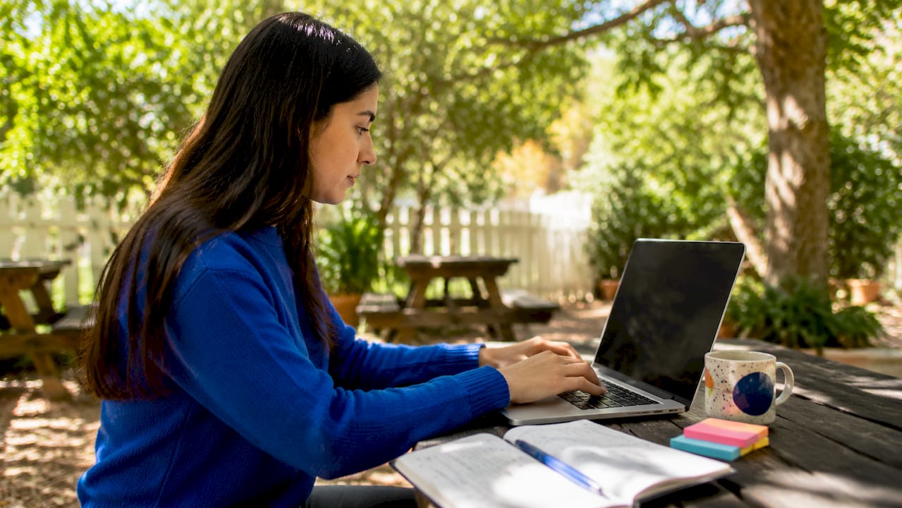 Hands navigating customer journey on mouse and tablet