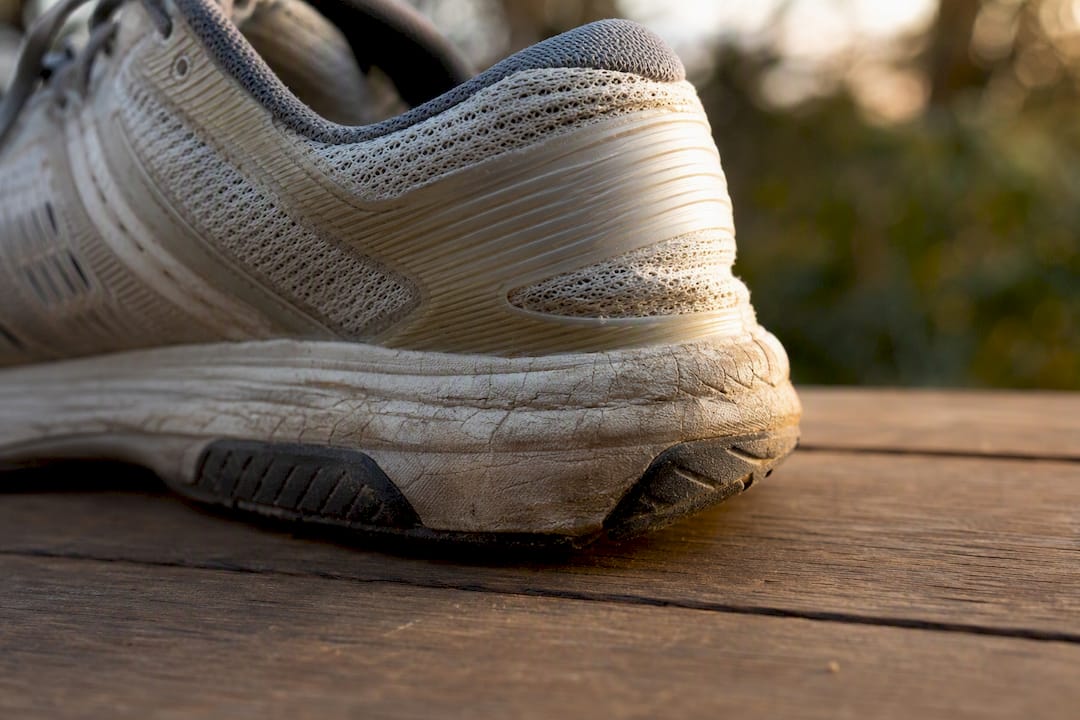 Worn running shoe midsole and outsole close-up