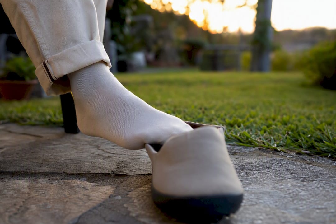 Foot fitting into wide toe box shoe