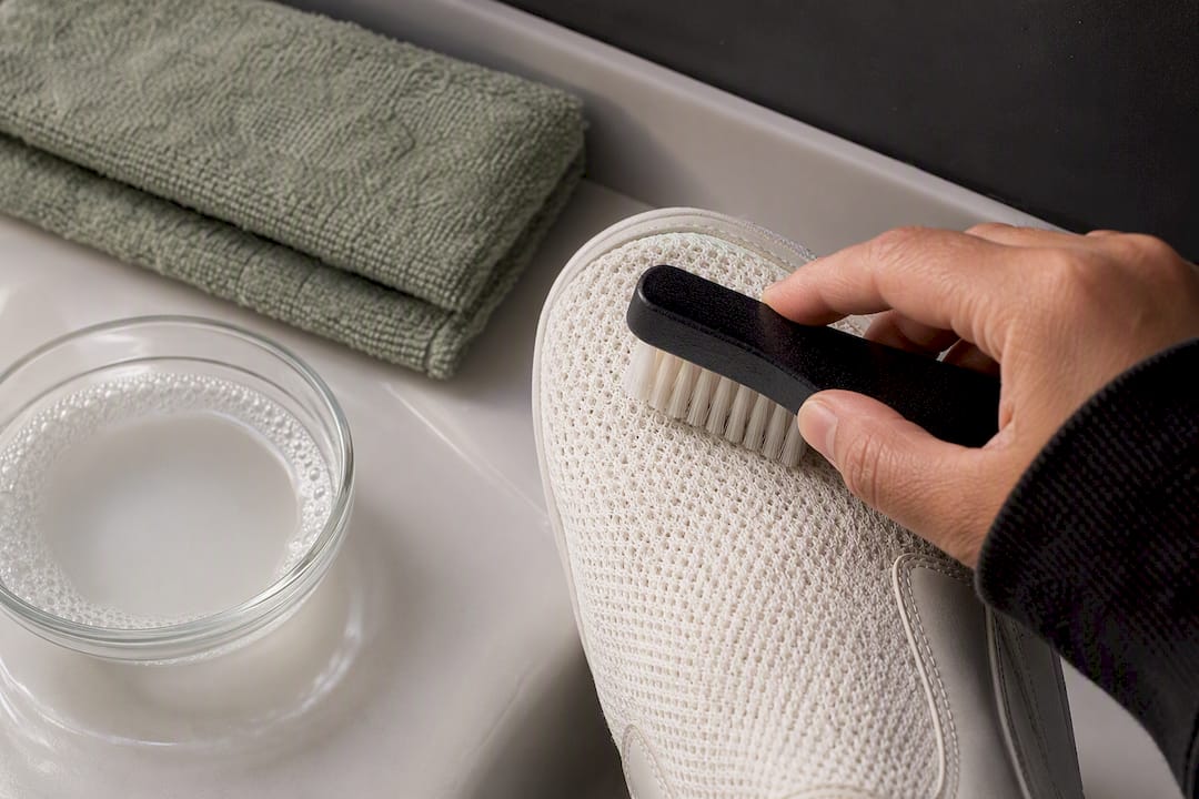 Soft brush cleaning white mesh sneaker fabric