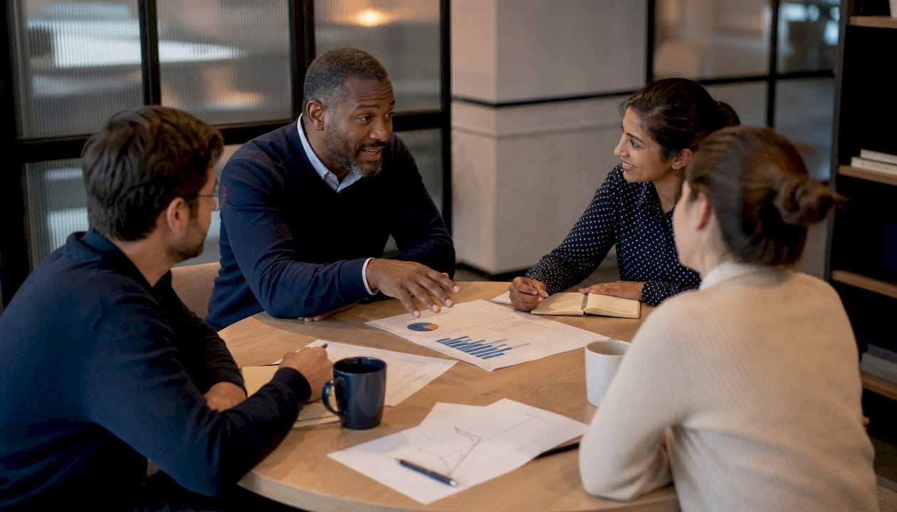 Sales team discussing performance metrics