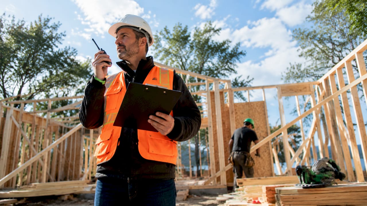 Project manager coordinating renovation team onsite