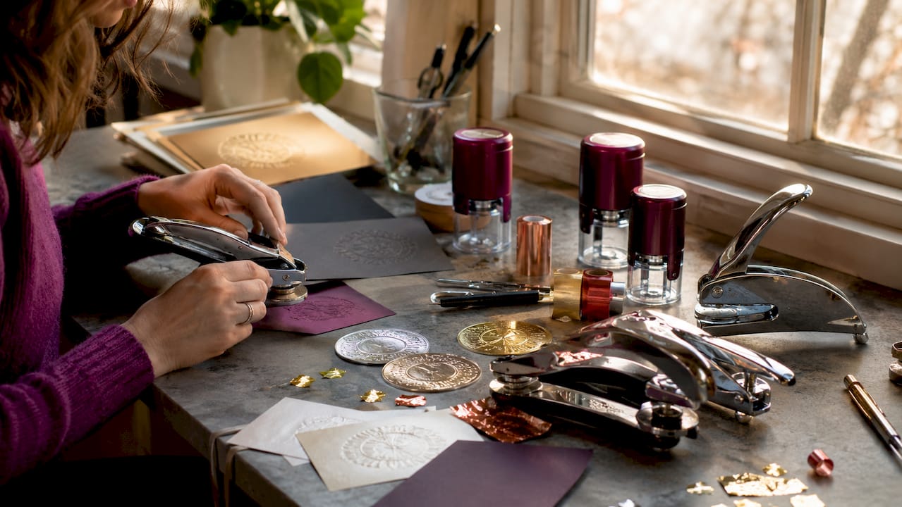 Close-up of dry stamping tools on white table