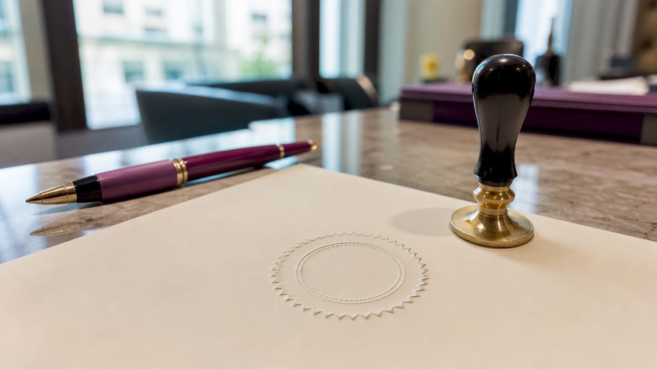 Close-up of notarial stamp on paper