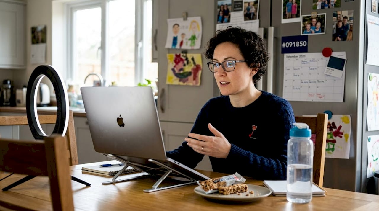 Woman rehearses interview on video call