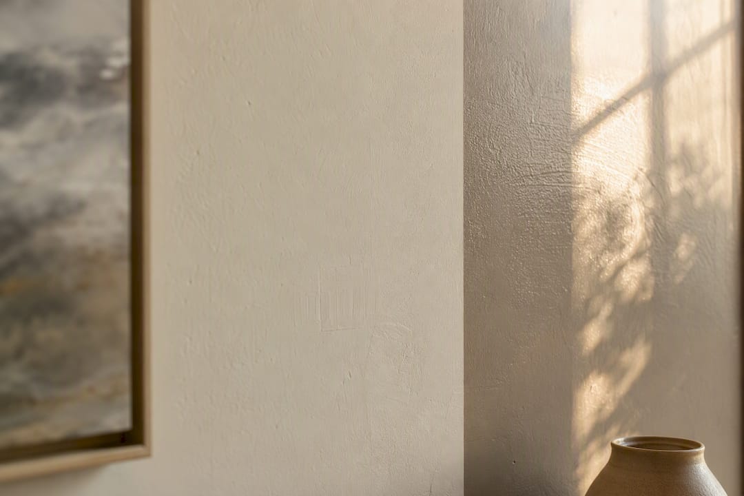 Comparison of matte and satin paint finishes on wall