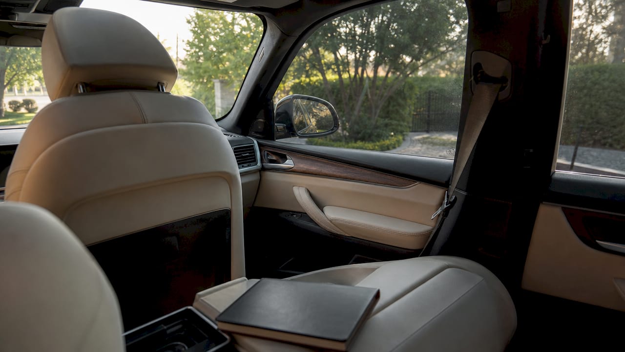 Car interior with sunlight filtered through tinted windows