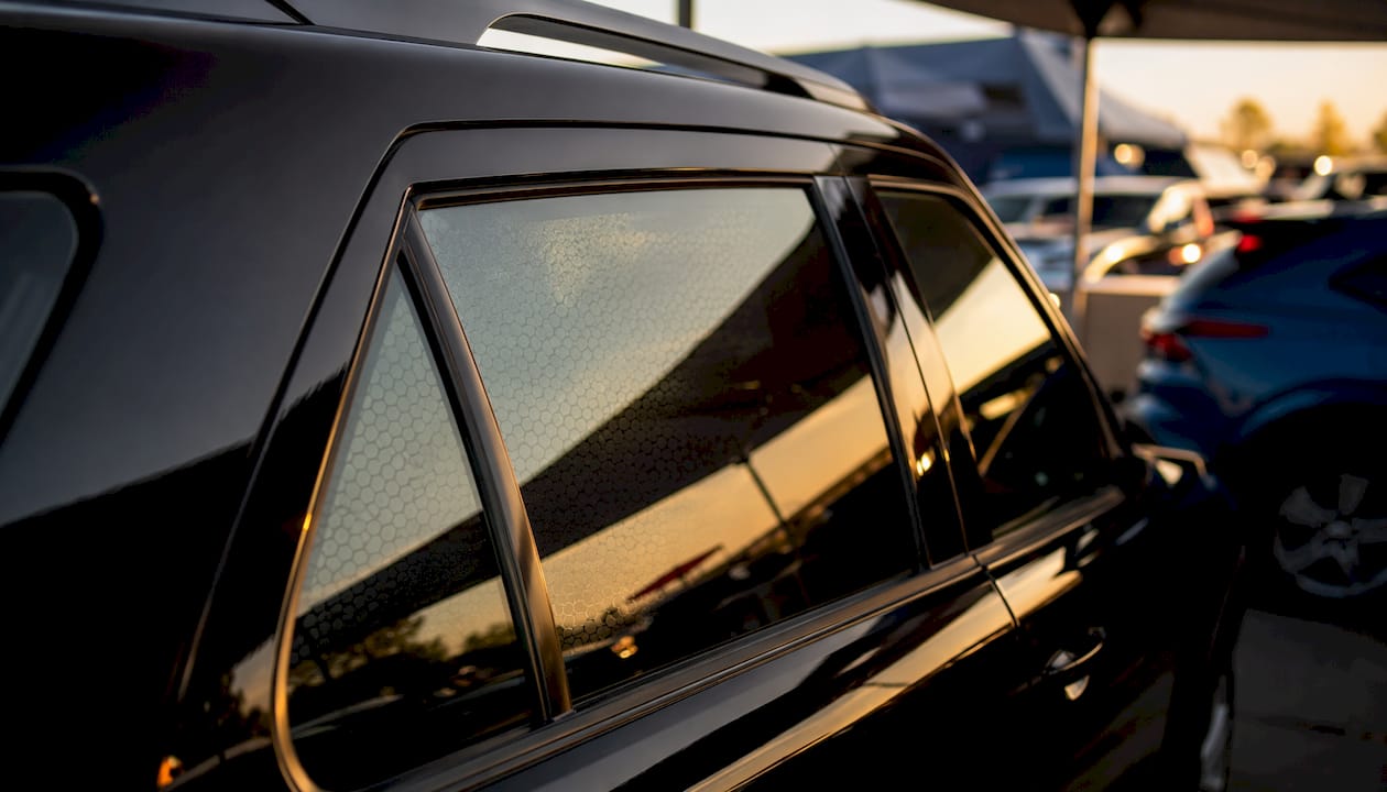 Close-up of car window with UV protection film