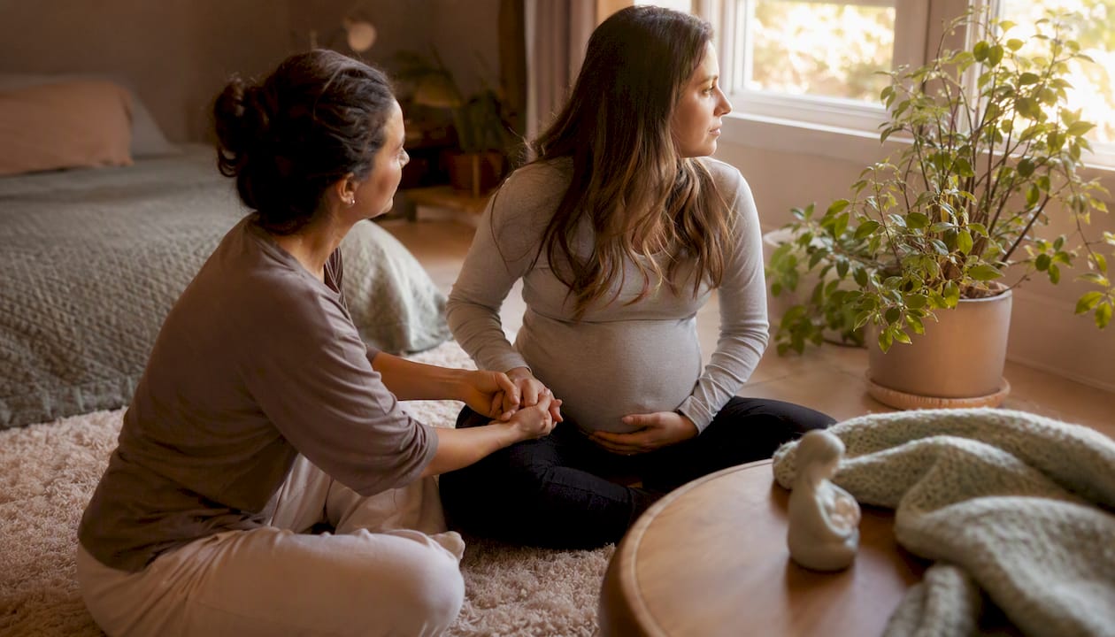 Doula offering quiet emotional support