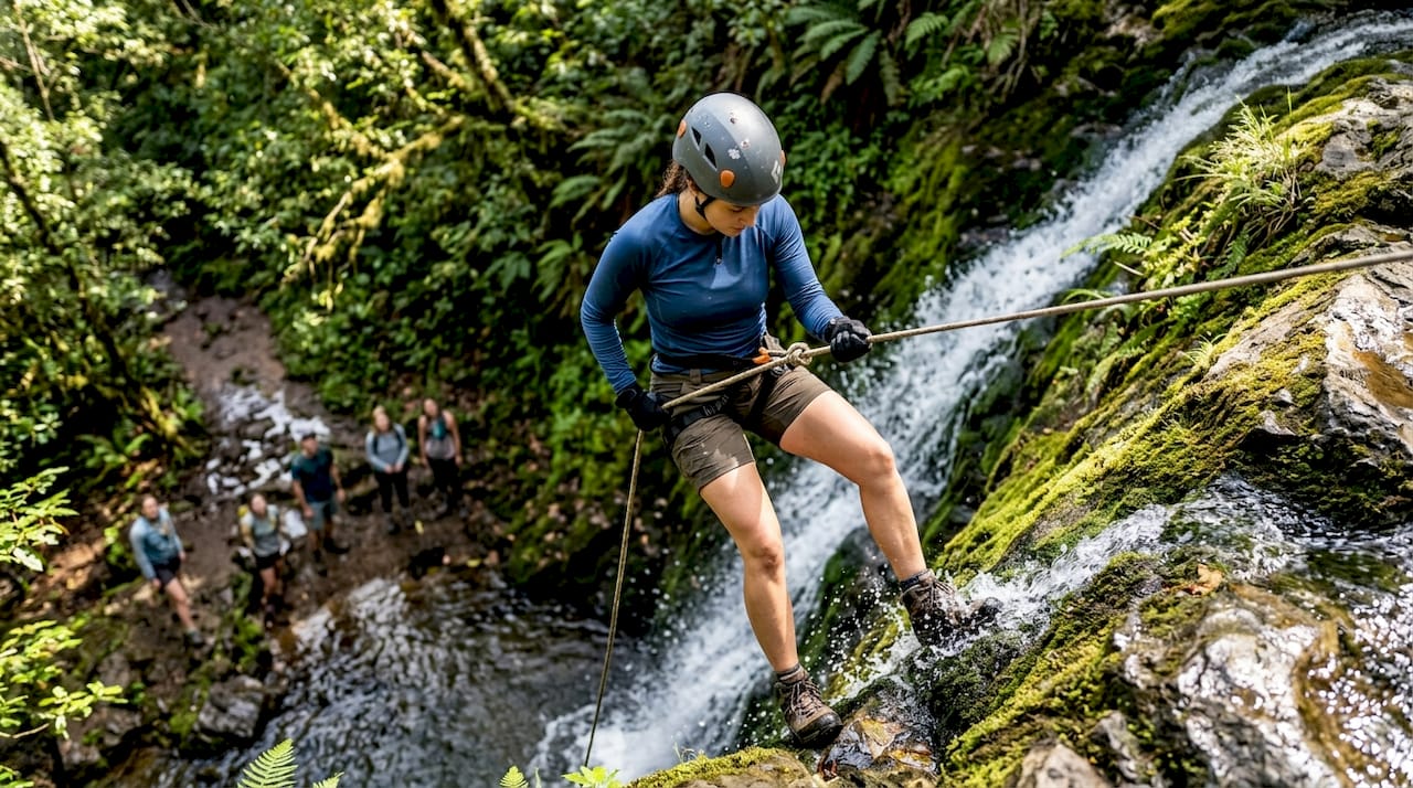 Tourist rappels down intermediate Costa Rica waterfall