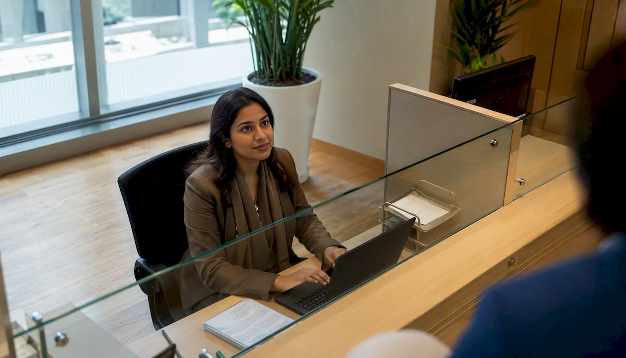 Dubai court clerk processing marriage license