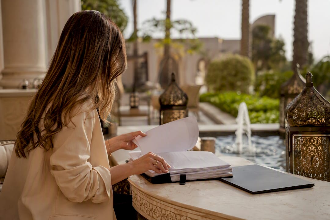 Wedding planner organizing permit materials